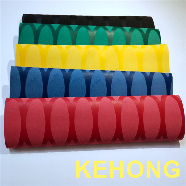 Heat shrink sleeve tennis grip