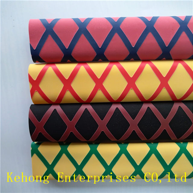 Heat shrink sleeve tennis grip